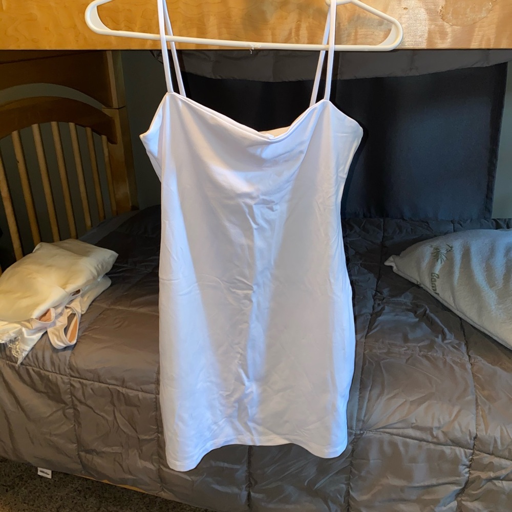 Worn once. Dry cleaned. White mini dress